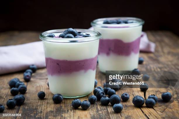 blueberry yogurt curd dessert on wood - curd cheese stock pictures, royalty-free photos & images