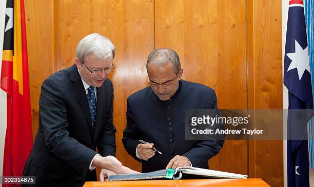 Dr Jose Ramos-Horta, President of the Democratic Republic of Timor-Leste, signs the visitors' book whilst Australian Prime Minister, Kevin Rudd looks...