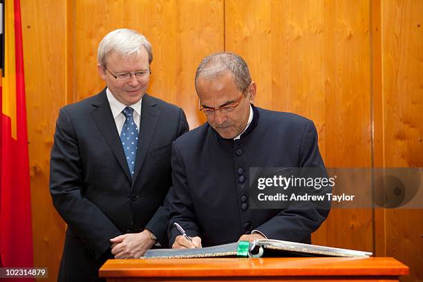 Dr Jose Ramos-Horta, President of the Democratic Republic of Timor-Leste, signs the visitors' book whilst Australian Prime Minister, Kevin Rudd looks...