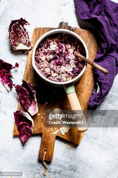 risotto with radicchio, red wine and pancetta - radicchio stock pictures, royalty-free photos & images