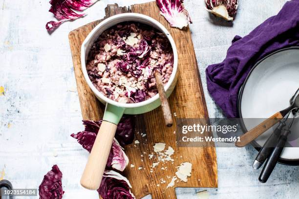risotto with radicchio, red wine and pancetta - radicchio stock pictures, royalty-free photos & images