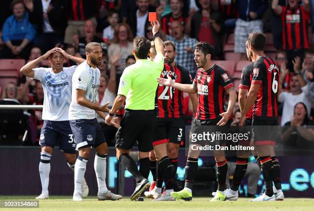 Richarlison of Everton is shown a red card by referee, Lee Probert during the Premier League match between AFC Bournemouth and Everton FC at Vitality...