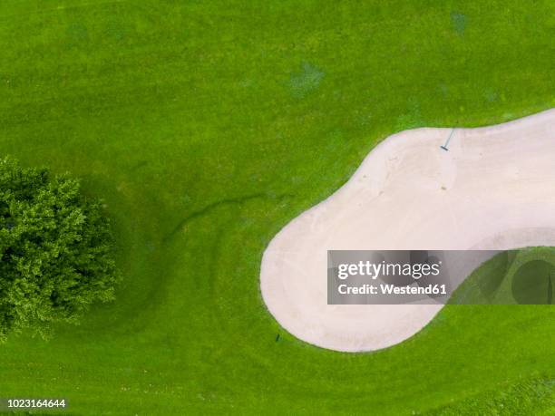 germany, baden-wuerttemberg, aerial view of golf course with bunker, green and rake - golf sand trap stock pictures, royalty-free photos & images