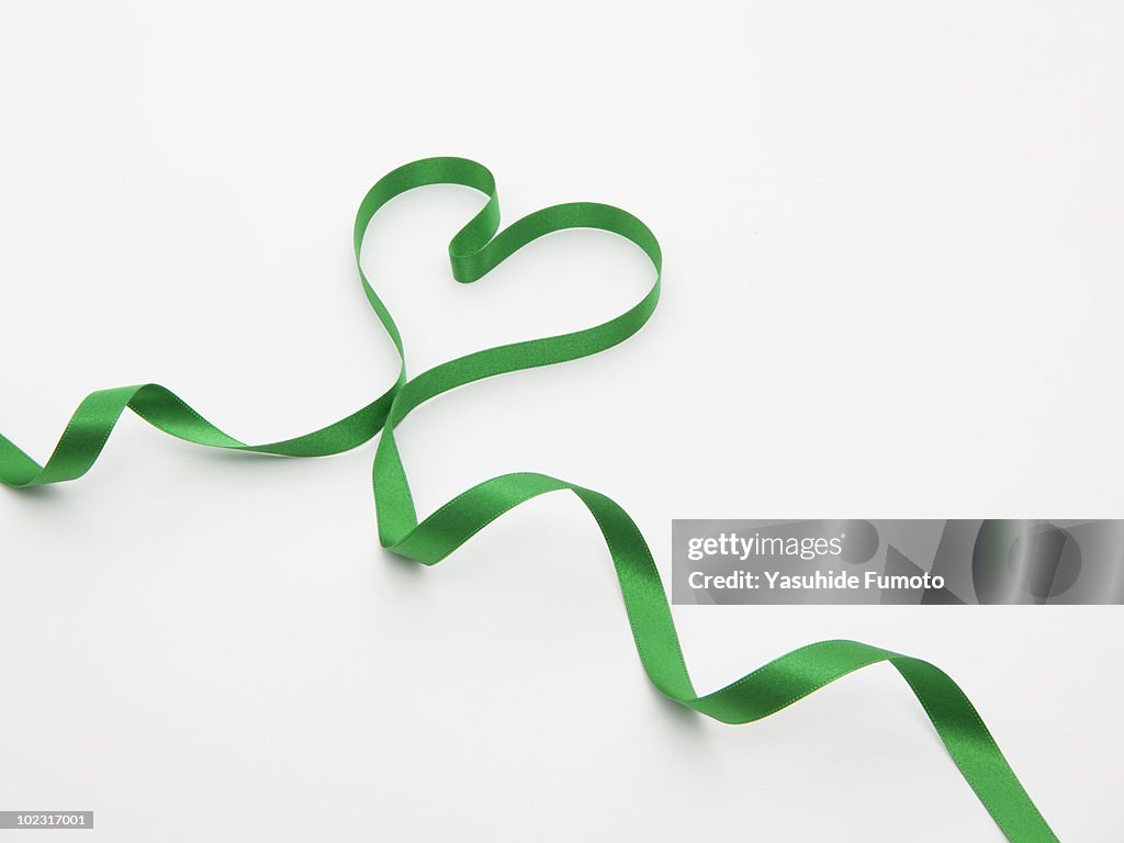 Green ribbon of heart shape.