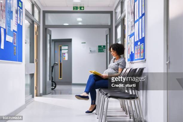 single parent to be - hospital waiting room stock pictures, royalty-free photos & images