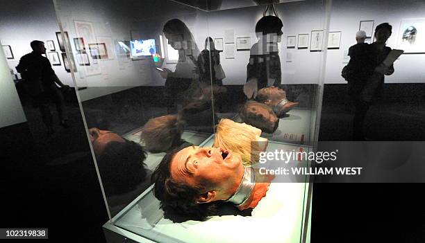 Two heads from the movie 'Mars Attack' sit in a cabinet at an major exhibition, presented as part of Melbourne Winter Masterpieces 2010, which...