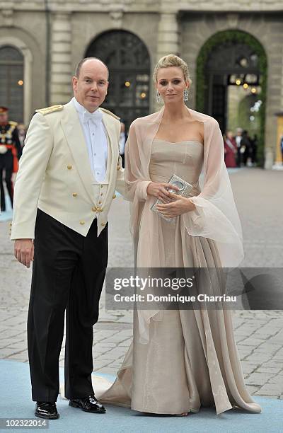 Prince Albert of Monaco and girlfriend Charlene Wittstock attend the wedding of Crown Princess Victoria of Sweden and Daniel Westling on June 19,...