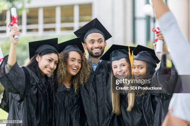 Graduates Bunch 14,810 Graduation Group Photo Stock Photos, High-Res Pictures, and ...
