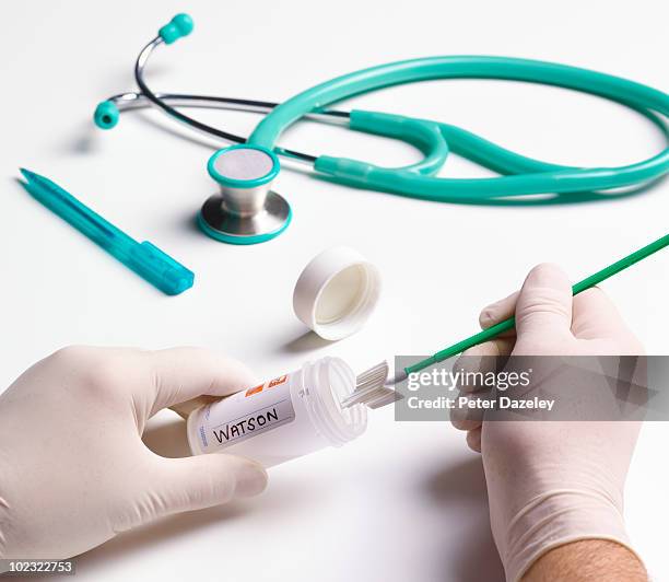 doctor preparing smear test for screening - cervical pap smear stock pictures, royalty-free photos & images