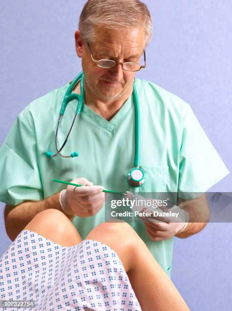 gynecologist taking smear test - gonorrhea bacterium stock pictures, royalty-free photos & images