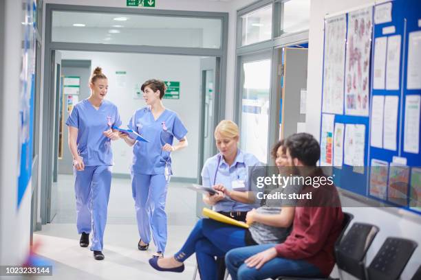 busy maternity corridor - returning goods stock pictures, royalty-free photos & images