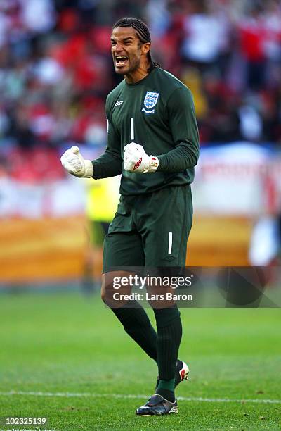 David James of England celebrates the opening goal by Jermain Defoe during the 2010 FIFA World Cup South Africa Group C match between Slovenia and...