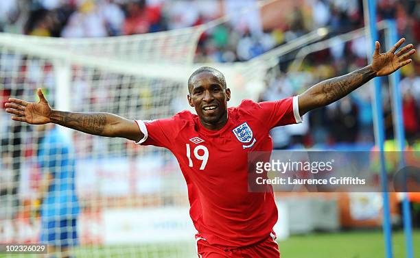 Jermain Defoe of England celebrates scoring the opening goal during the 2010 FIFA World Cup South Africa Group C match between Slovenia and England...