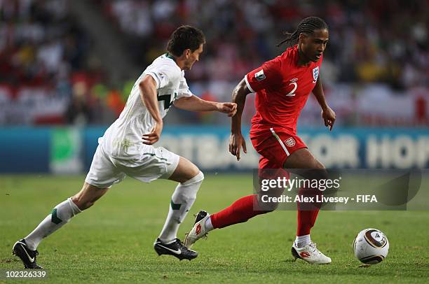 Glen Johnson of England in action against Andraz Kirm of Slovenia during the 2010 FIFA World Cup South Africa Group C match between Slovenia and...