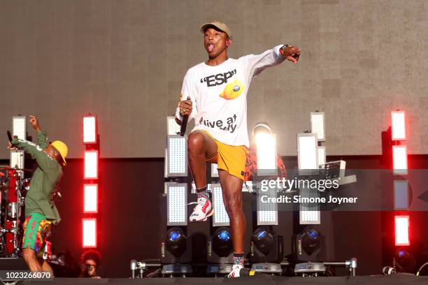 Pharrell Williams of N.E.R.D performs live on stage during day two of Reading Festival at Richfield Avenue on August 25, 2018 in Reading, England.