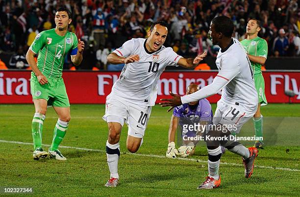 Landon Donovan of the United States celebrates scoring the winning goal that sends the USA through to the second round during the 2010 FIFA World Cup...