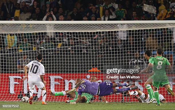 Landon Donovan of the United States scoring the winning goal that sends the USA through to the second round during the 2010 FIFA World Cup South...