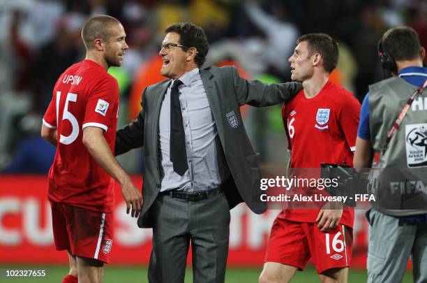 Fabio Capello manager of England congratulates Matthew Upson and James Milner of England after the 2010 FIFA World Cup South Africa Group C match...