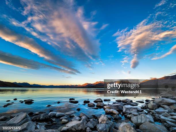 new zealand, south island, canterbury region, lake tekapo at sunset - horizontal stock pictures, royalty-free photos & images