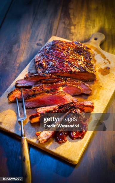 medium rare beefsteak on wooden board - red meat stock pictures, royalty-free photos & images