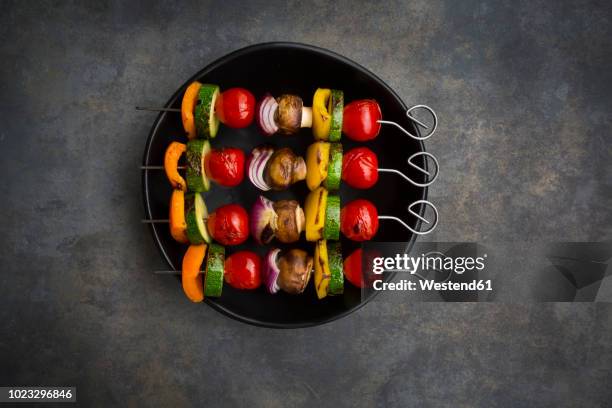 vegetarian grill skewers on bowl - vegetable skewer stock pictures, royalty-free photos & images