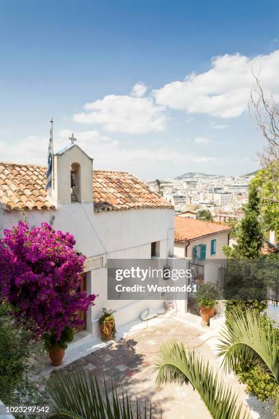 greece, attica, athens, plaka district, greek chapel and flowering bougainvillea - plaka stock pictures, royalty-free photos & images