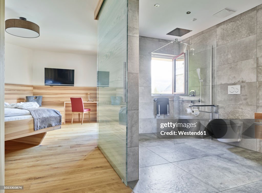 Interior of bedroom and bathroom of a holiday home