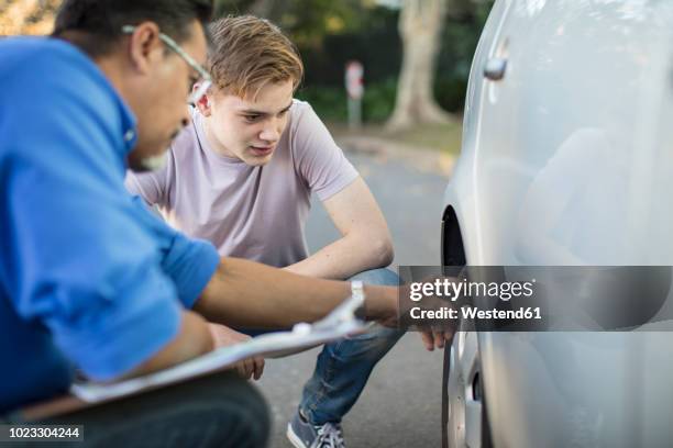 Checking Tyers Checking Tires Photos and Premium High Res Pictures - Getty Images