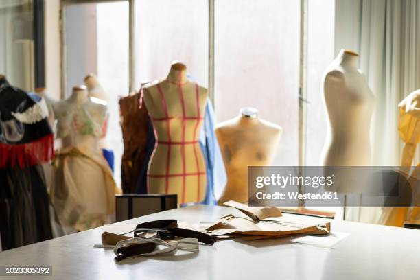 dressmaker's models in fashion designer's studio - sewing pattern stock pictures, royalty-free photos & images
