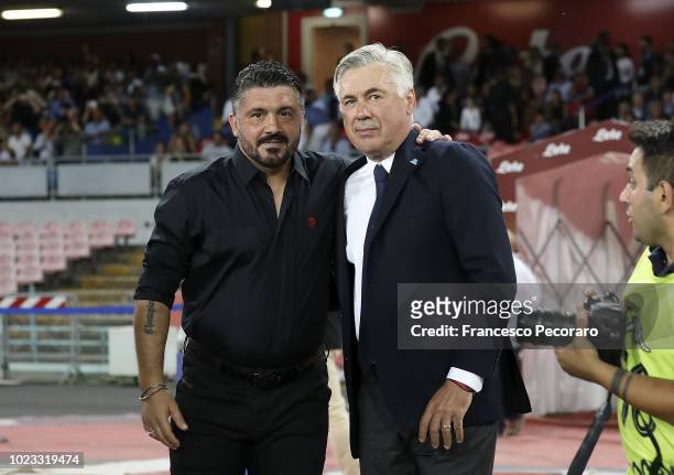 Coach of SSC Napoli Carlo Ancelotti greets coach of AC Milan Gennaro Gattuso before the serie A match between SSC Napoli and AC Milan at Stadio San...