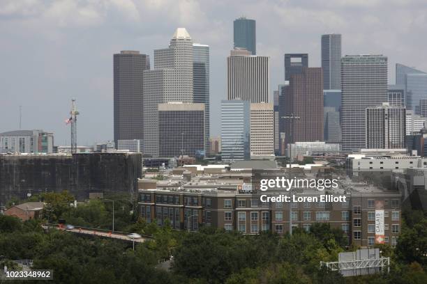 The downtown skyline is pictured on August 25, 2018 in Houston, Texas. August 25 is the one-year anniversary of when Hurricane Harvey made landfall...