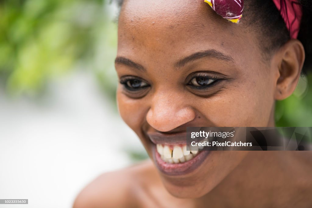 Portrait young African woman smiling