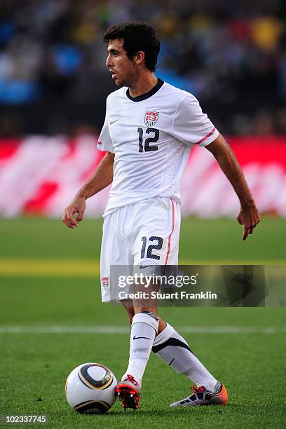 Jonathan Bornstein of the United States runs with the ball during the 2010 FIFA World Cup South Africa Group C match between USA and Algeria at the...