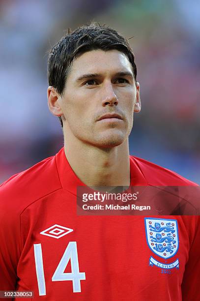 Gareth Barry lines up for the national anthems prior to the 2010 FIFA World Cup South Africa Group C match between Slovenia and England at the Nelson...