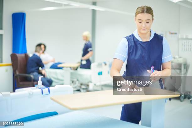 hospital infection control - teenage hospital volunteer stock pictures, royalty-free photos & images