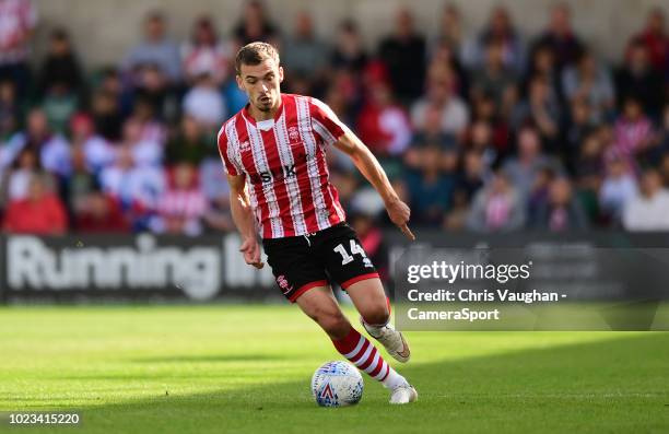 Lincoln City's Harry Toffolo during the Sky Bet League Two match between Lincoln City and Notts County at Sincil Bank Stadium on August 25, 2018 in...