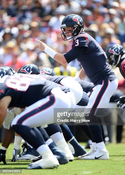 Brandon Weeden of the Houston Texans prepares to take a snap during a preseason game against the Los Angeles Rams at Los Angeles Memorial Coliseum on...