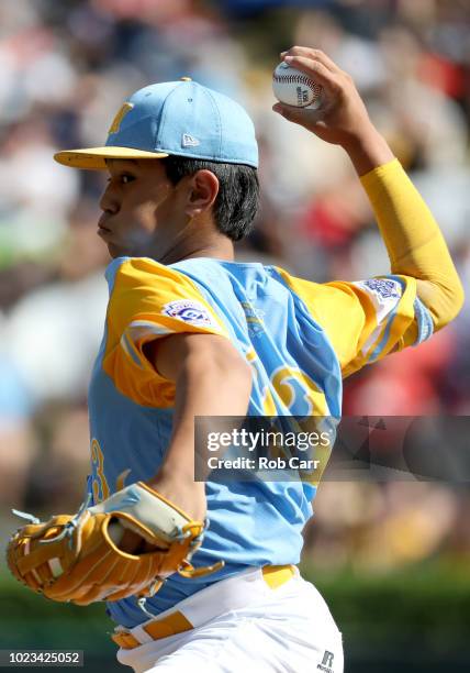 Starting pitcher Aukai Kea of the West Region from Hawaii throws to a batter from the Southeast Team of Georgia during the U.S. Championship game of...