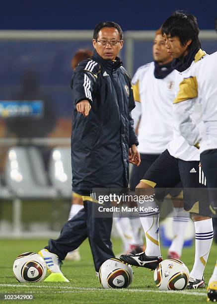 Japan coach Takeshi Okada gives instructions at a Japan training session during the FIFA 2010 World Cup at Royal Bafokeng Stadium on June 23, 2010 in...