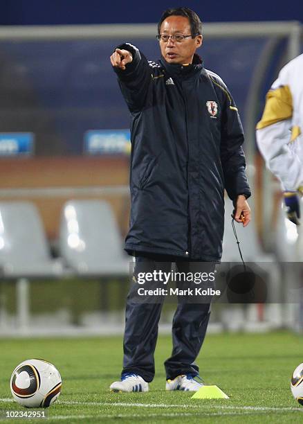 Japan coach Takeshi Okada gives instructions at a Japan training session during the FIFA 2010 World Cup at Royal Bafokeng Stadium on June 23, 2010 in...