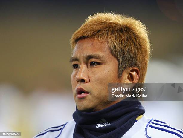 Junichi Inamoto watches on at a Japan training session during the FIFA 2010 World Cup at Royal Bafokeng Stadium on June 23, 2010 in Rustenburg, South...