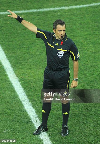 Referee Jorge Larrionda points as he make a decision during the 2010 FIFA World Cup South Africa Group D match between Australia and Serbia at...