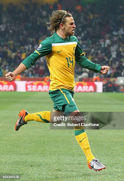 Brett Holman of Australia celebrates scoring his side's second goal during the 2010 FIFA World Cup South Africa Group D match between Australia and...