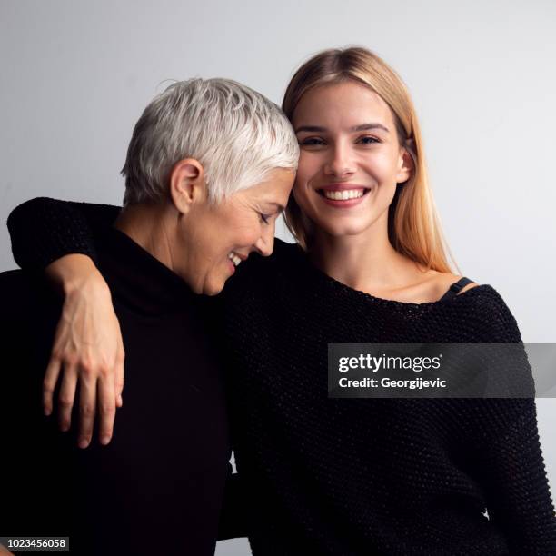 moment with mother - beautiful grandmothers stock pictures, royalty-free photos & images