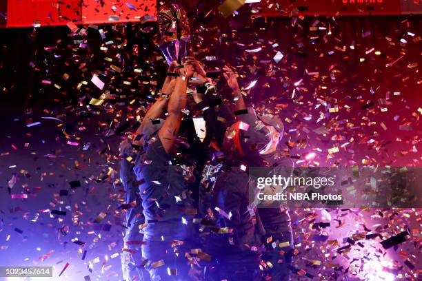 Knicks Gaming hold up the 2K League Championship trophy after winning the 2018 NBA 2K League Finals on August 25, 2018 at the NBA 2K Studio in Long...