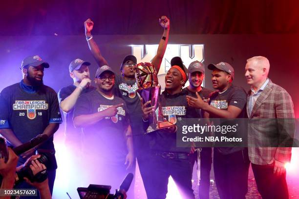 Knicks Gaming hold up the 2K League Championship trophy after winning the 2018 NBA 2K League Finals on August 25, 2018 at the NBA 2K Studio in Long...
