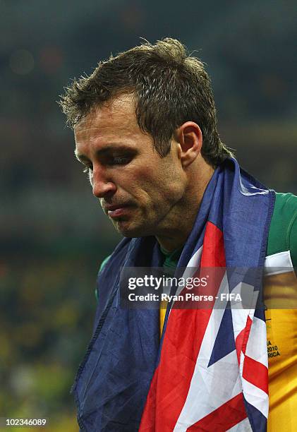 Lucas Neill of Australia leaves the field dejected after the 2010 FIFA World Cup South Africa Group D match between Australia and Serbia at Mbombela...