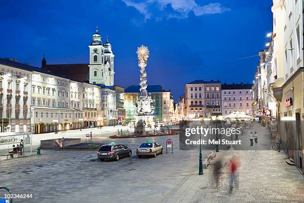 austria, linz, old cathedral with market place - linz stock-fotos und bilder