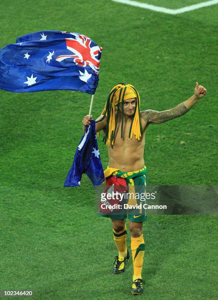 Tim Cahill of Australia gives the thumbs up to fans after victory in the game but elimination from the tournament after the 2010 FIFA World Cup South...