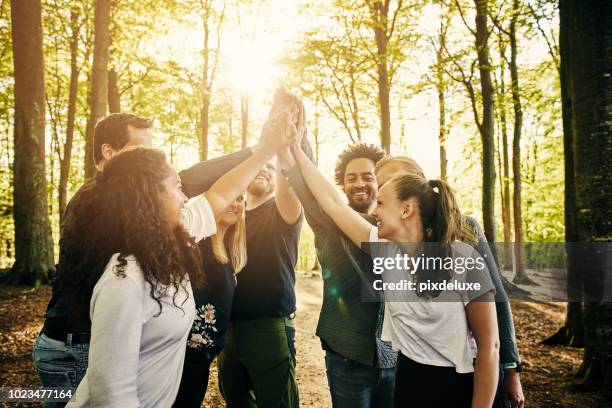 stronger together - group sports activity stock pictures, royalty-free photos & images